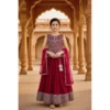 Maroon embroidered lehenga with flared skirt and embellished border – perfect for weddings and festive occasions