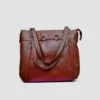 Classic deep cognac genuine leather tote bag with natural grain texture and premium craftsmanship