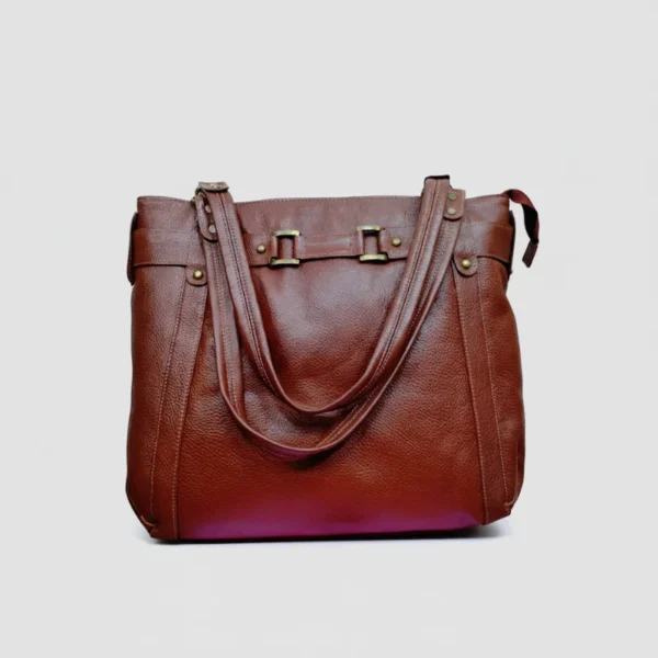 Classic deep cognac genuine leather tote bag with natural grain texture and premium craftsmanship