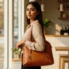 Tan genuine leather tote bag with natural grain texture and a spacious, elegant design perfect for everyday use.